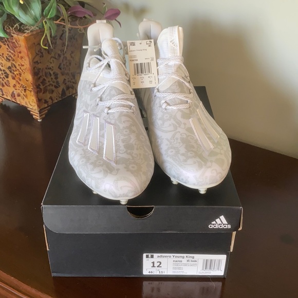 Men’s Adidas cleats. US 12. New in box.